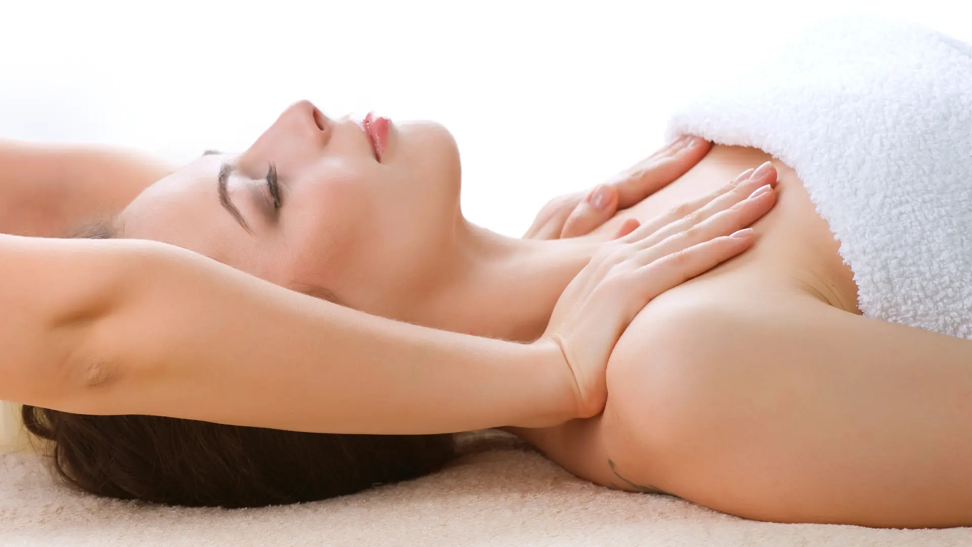 woman getting shoulder rub in spa